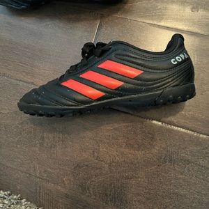 Kids adidas soccer shoes in good condition.